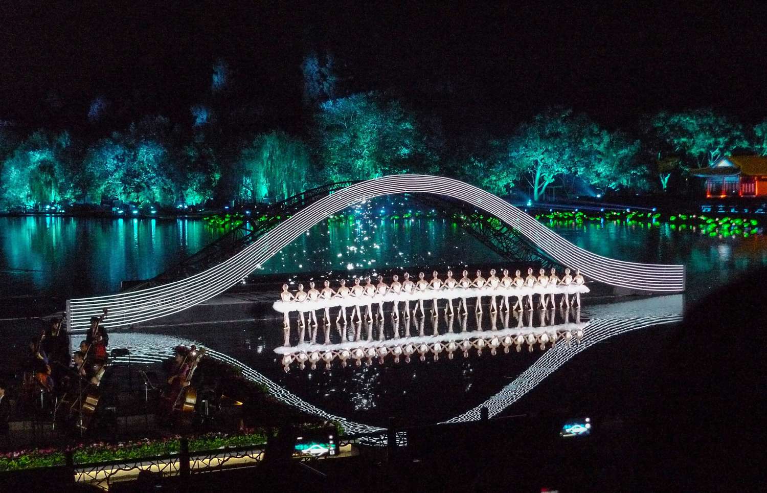 The stage was immersed just below the surface of the lake to give the illusion that the performers are floating on water