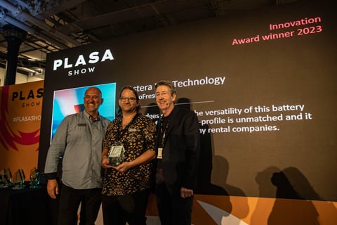 Astera’s Simon Canins (centre) collects a 2023 PLASA Award for Innovation with Adam Blaxill, chair of PLASA’s governing body (left), and Peter Heath, PLASA managing director
