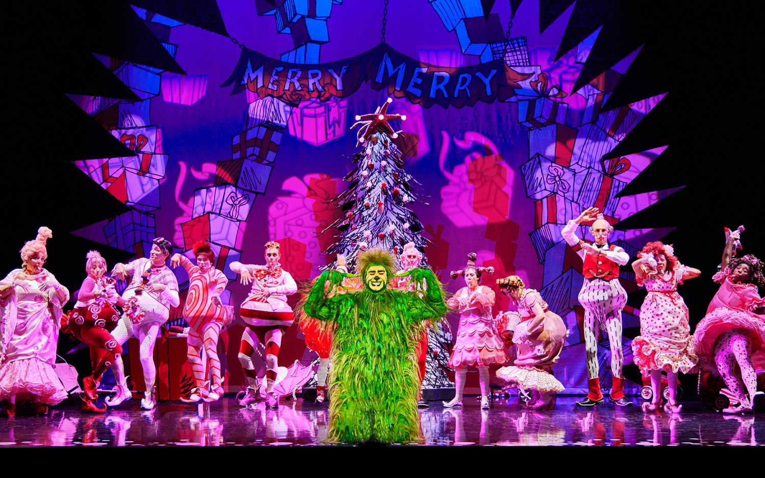James Schultz as The Grinch and the touring company (photo: Jeremy Daniel)