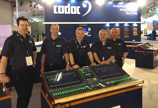 The new Cadac CDC seven and the booth team: Nick Fletcher director of R&D, James Godbehear marketing manager, Peter Hearl senior software architect, Rob Hughes European technical sales manager and David Kan, general manager