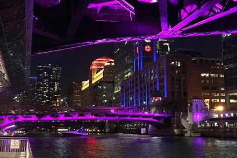 Rogue R2 Washes bathe Chicago’s Clark Street and Dearborn Street Bridges in a vibrant purple