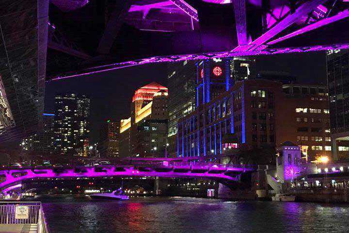 Rogue R2 Washes bathe Chicago’s Clark Street and Dearborn Street Bridges in a vibrant purple