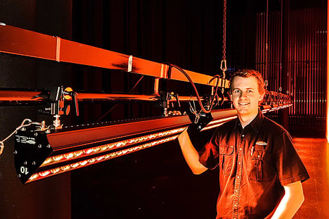 Ben Hunt at the Empire Theatres, with the newly delivered Robert Juliat Dalis lights (photo:  Kris Stewart)