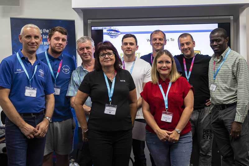 Students pictured with tutors Andy Friedli (far left) and Mandy Bullock-Williams (fourth from left)