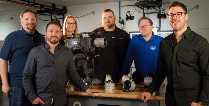 Christian Foster (lens technician), Peter Fodero (operations manager), Kelli Bingham (regional marketing executive), Jim Cook (prep technician), Mike Sippel (senior field support technician), Kyle Baggett (client contact)