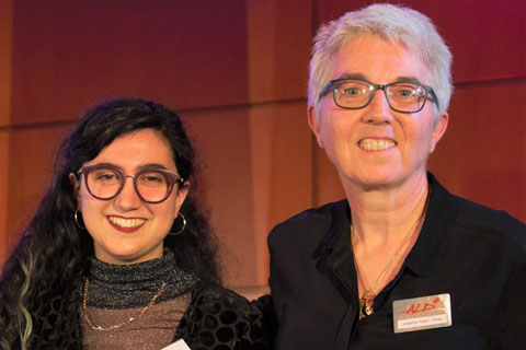 Lucia Sanchez Roldan, joint winner of the Michael Northen Award for Lighting Design, receives her award from ALD chair, Johanna Town