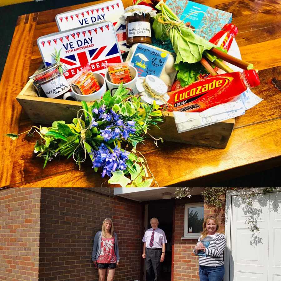 GIG’s global operations director, Bonnie May presents 97 year old WWII veteran with a hamper on VE Day 75