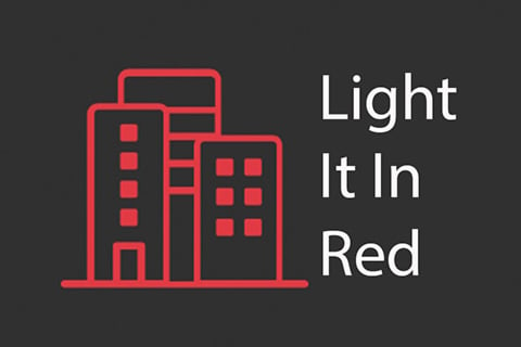 The #LightItInRed action was inspired by #NightofLight in Germany