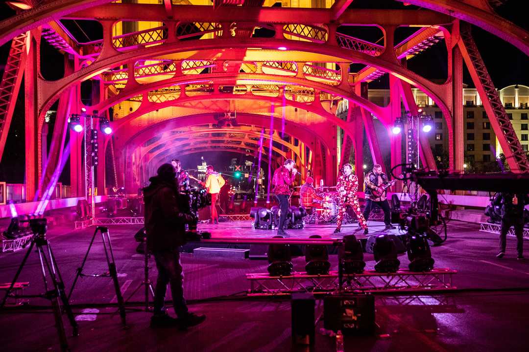 Forming the scenic backdrop and surrounding the band for the shoot was Tower Bridge