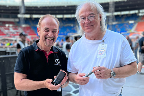 Martin Seidl, CEO of Austrian Audio, holding a OC18, with David Natale, FOH engineer for The Rolling Stones