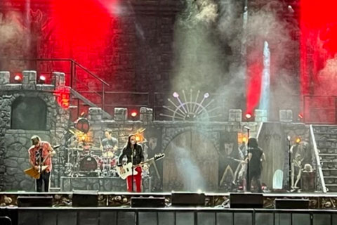 The band did not use amps onstage to accommodate the set design