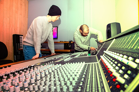 The control room houses the Audient console, Genelec monitoring and Mac Mini M1 running ProTools